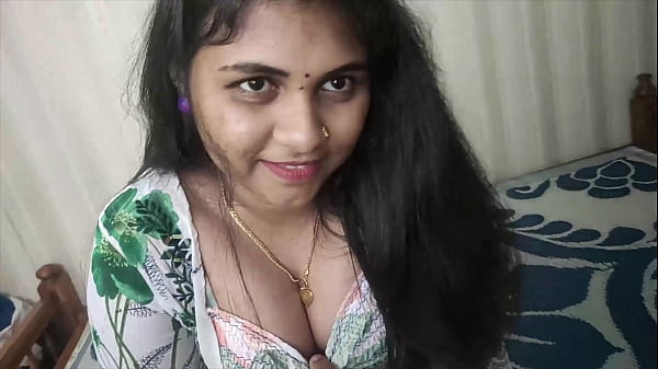 Fille indienne au lit avec son amant, partageant de doux baisers et des touches ludiques